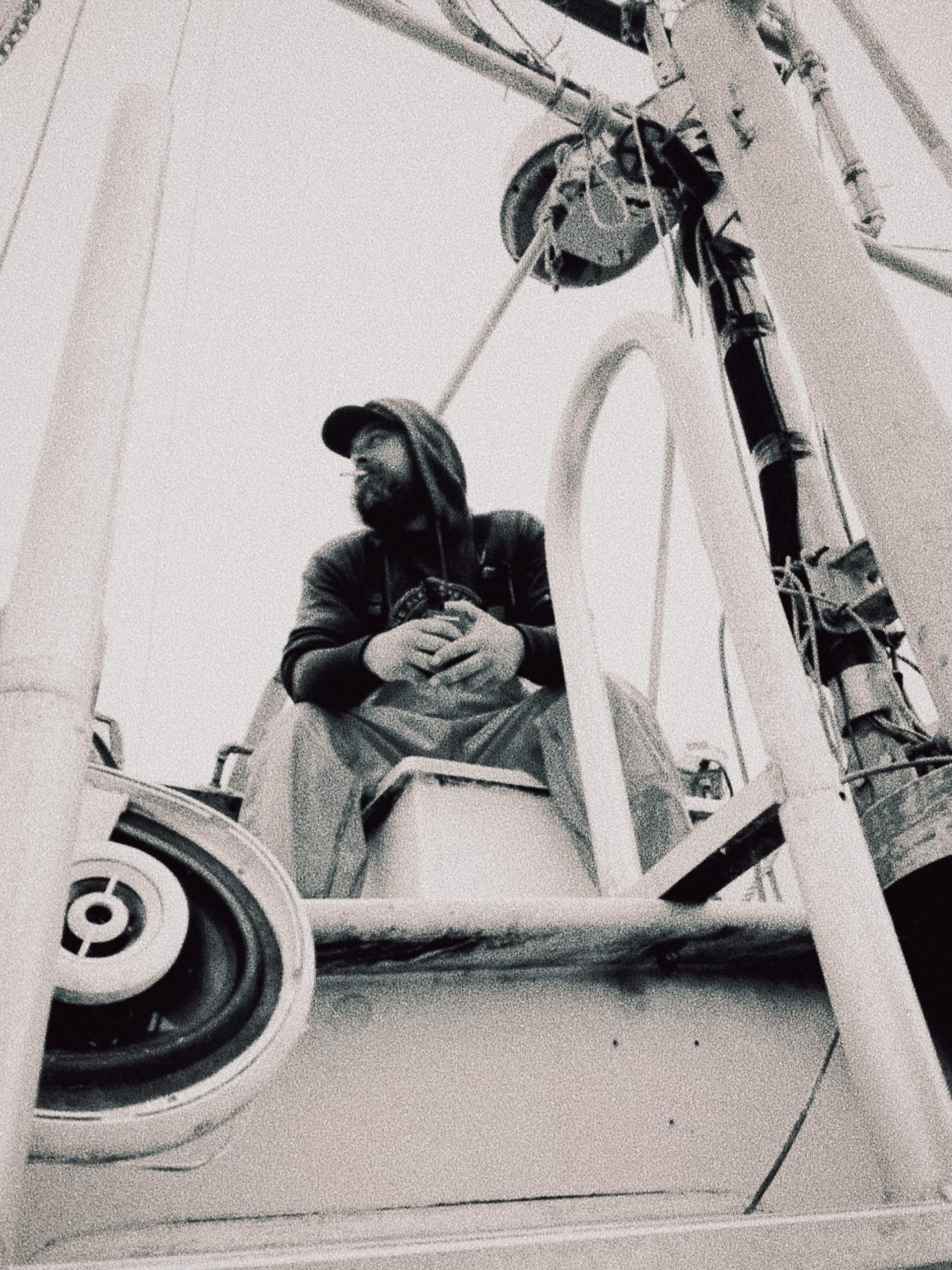 A deckhand in the rigging of an Alaskan fishing boat
